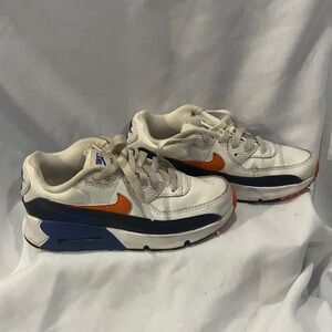 Nike Kids White and Navy Sneakers with Orange Swoosh